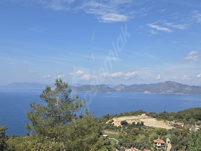 REMAXTAN - FARALYADA FULL DENİZ MANZARALI, MÜSTAKİL TAPULU KÖY İÇİ İMARLI 6407 m² YATIRIMLIK ARAZİ - Görsel 3
