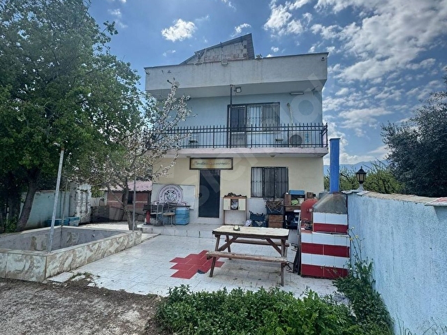 ARKADAŞ EMLAKTAN KARAOĞLANLIDA SATILIK 2 KATLI EV VE ARSA