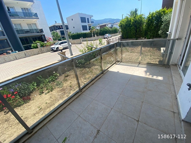 PELİTTEN KUŞADASI DAVUTLARDA MİMOZA EVLERİNDE 3+1 BAHÇELİ DAİRE