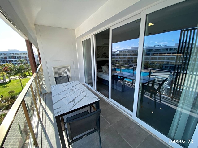 KKTCDE İSKELE LONG BEACHTE OTEL KONSEPTİ HAVUZ MANZARALI SATILIK GENİŞ 1+0 STÜDYO DAİRE - Görsel 9