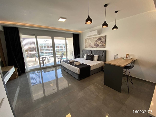 KKTCDE İSKELE LONG BEACHTE OTEL KONSEPTİ HAVUZ MANZARALI SATILIK GENİŞ 1+0 STÜDYO DAİRE - Görsel 2