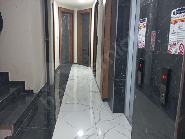ŞEHRİN MERKEZİNDE MODERN MİMARİYLE KONFORLU YAŞAM 1+1 DAİRE - Görsel 9