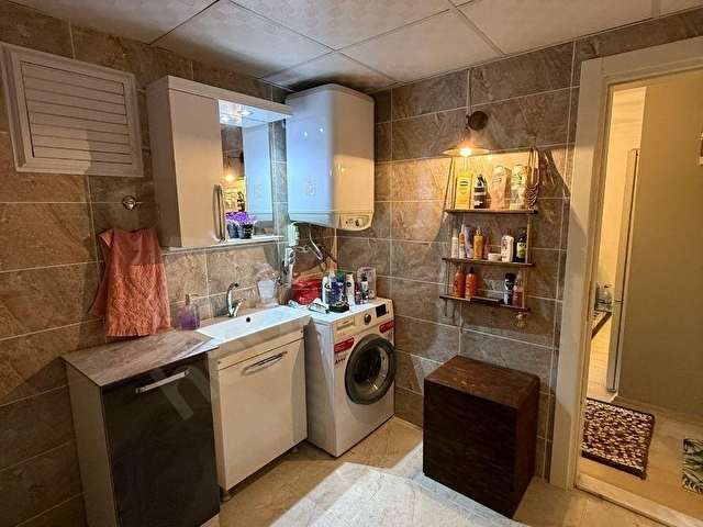 KUŞADASI SİTE İÇERİSİNDE DENİZ MANZARALI GENİŞ 1+1 SATILIK DAİRE - Görsel 13