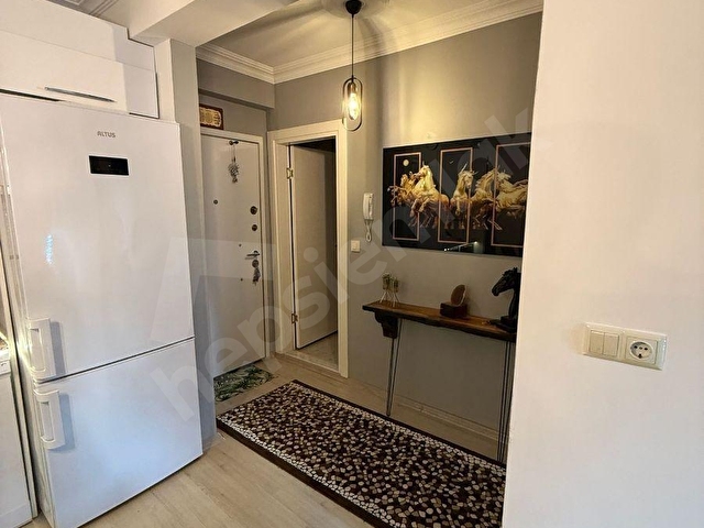 KUŞADASI SİTE İÇERİSİNDE DENİZ MANZARALI GENİŞ 1+1 SATILIK DAİRE - Görsel 11
