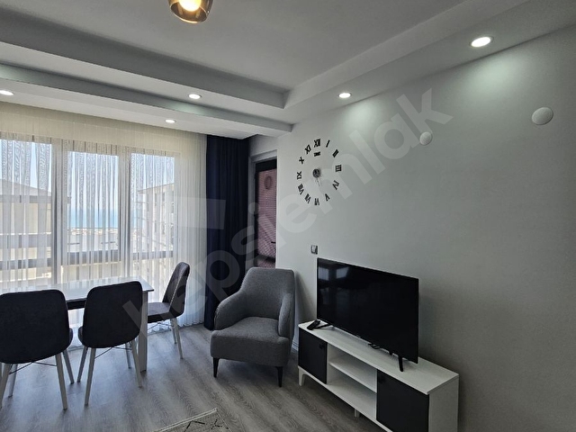 Körfez mahallesinde satılık deniz manzaralı eşyalı 1+1 daire
