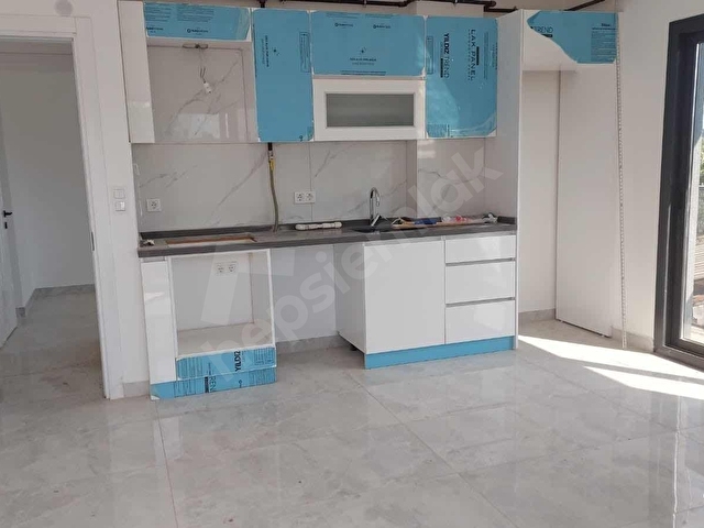 Ula Merkezde Lüx Sıfır Yerden Isıtmalı Kiralık Daire - Görsel 12