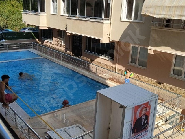 FATİH EMLAKTAN KUMLADA SATILIK HAVUZLU DAİRE