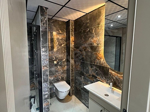 ERDEMLİ MERKEZ MAH.DE HAVUZLU SOSYAL DONATILI 3+1 SATILIK DAİRE - Görsel 14