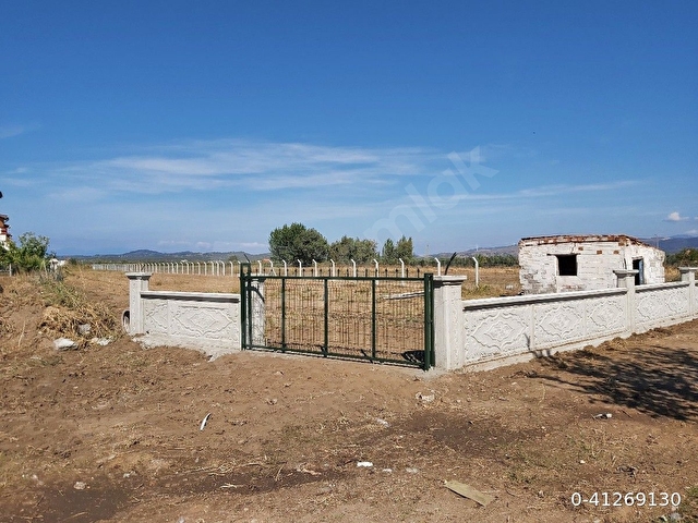 İMAR BİTİŞİĞİNDE TARLA VASIFLI ARSA