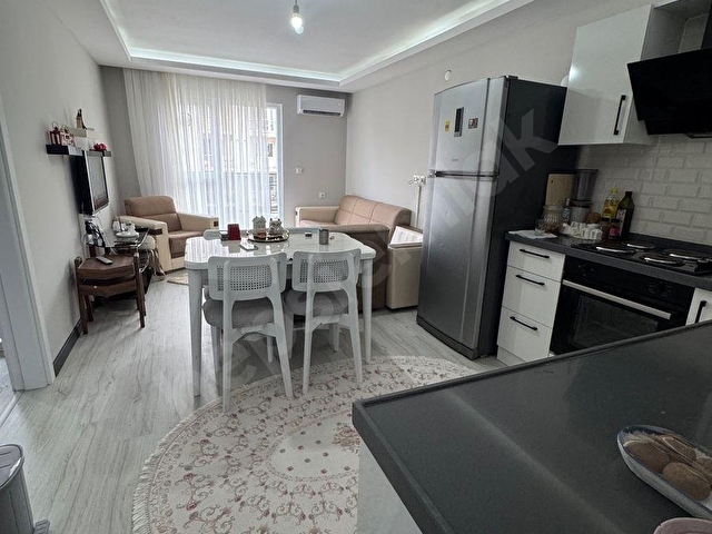 MUHİTTİN MAHALLESİ SİTE İÇİNDE ARA KAT YERDEN ISITMA BALKONLU 1+1 KLİMALI SIFIR DAİRE - Görsel 14