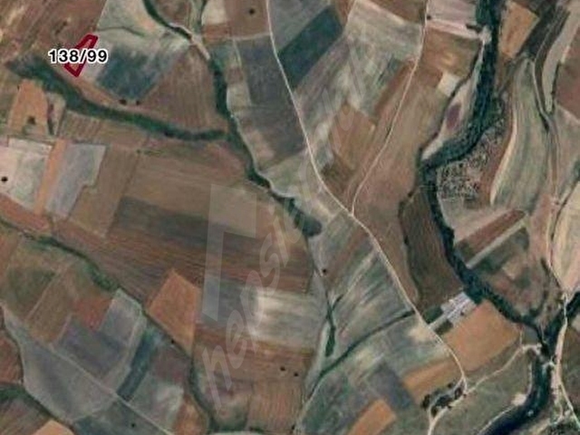 Uzunhacı mahallesinde Yatırımlık Hisseli Parselimiz Satılıktır