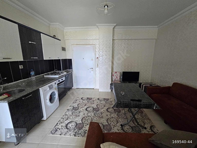 AKTİFTEN HAVUZLU SİTE İÇERSİNDE KAT MÜLKİYETLİ SATILIK 2+0 DAİRE - Görsel 2