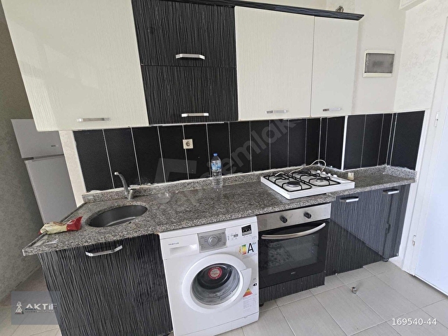 AKTİFTEN HAVUZLU SİTE İÇERSİNDE KAT MÜLKİYETLİ SATILIK 2+0 DAİRE - Görsel 4