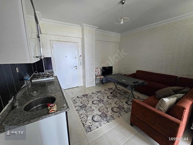 AKTİFTEN HAVUZLU SİTE İÇERSİNDE KAT MÜLKİYETLİ SATILIK 2+0 DAİRE