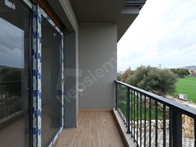 İZMİR FOÇA VİLLALAR BÖLGESİNDE FERAH SIFIR LÜKS SATILIK DAİRE - Görsel 24