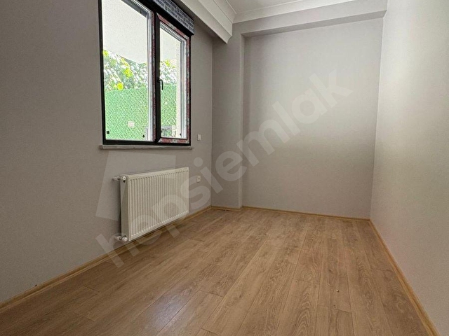ROTADAN LİBADİYEDE SIFIR-GENİŞ VERANDALI-YÜKSEK İRTİFAKLI 1+1 BAHÇE KATI SATILIK DAİRE - Görsel 9