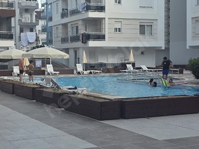 Konyaaltı hurmada havuzlu 1+1 eşyalı kiralık daire