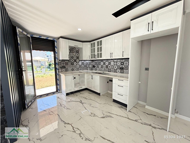 ÜRKMEZ DOĞANBEYde SATILIK SIFIR TEK MÜSTAKİL GENİS 3+1 VİLLA - Görsel 20