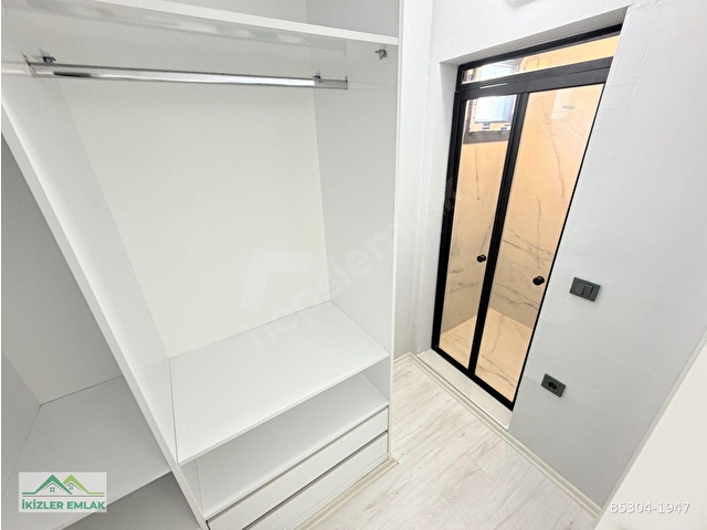 ÜRKMEZ DOĞANBEYde SATILIK SIFIR TEK MÜSTAKİL GENİS 3+1 VİLLA - Görsel 26
