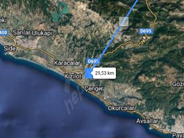 Akseki Sadıklar köyünde köye yakın asfalt kenarında mükemmel konumda yatırımlık tarla