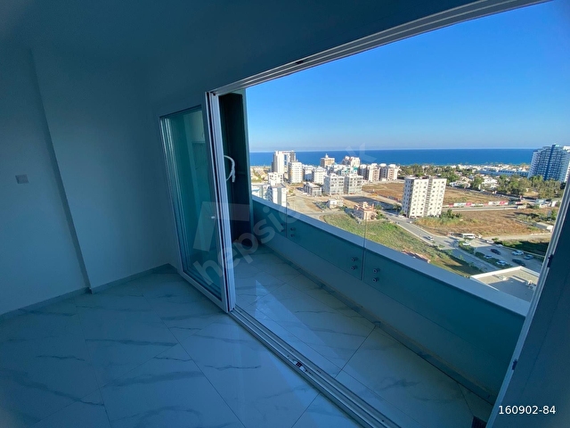 KUZEY KIBRISTA İSKELE LONG BEACHTE 14. KAT FUL DENİZ MANZARALI SATILIK SIFIR DAİRE