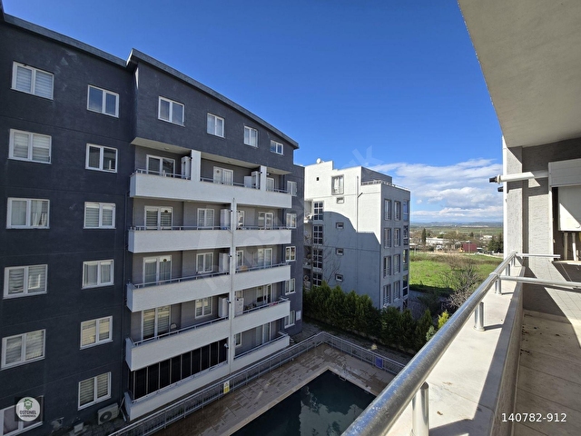 ÜSTÜNELDEN HAVUZLU SİTEDE ARAKAT KAT MÜLKİYETLİ SATILIK DAİRE - Görsel 5