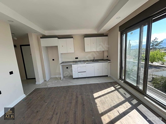 ÜNSALDA ARA KAT SIFIR 1+1 SATILIK DAİRE - Görsel 11