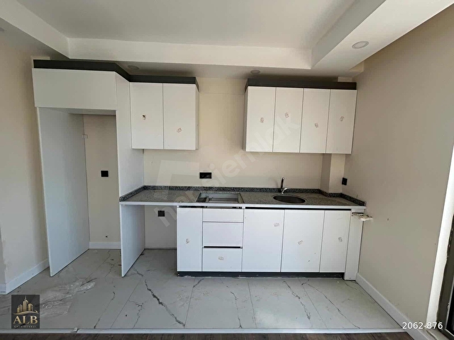 ÜNSALDA ARA KAT SIFIR 1+1 SATILIK DAİRE - Görsel 16