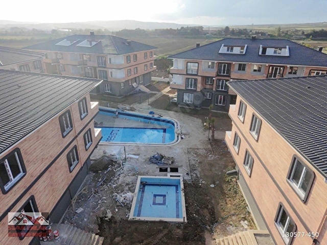 KUMBAĞDA HAVUZLU AQUPARKLI SİTEDE BAHÇELİ 1+1 SATILIK DAİRE - Görsel 3