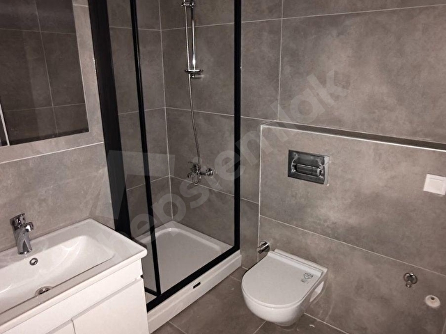 YERDEN ISITMALI KAPALI BALKONLU SIFIR 1+1 KİRALIK DAİRE çınar emlaktan - Görsel 22