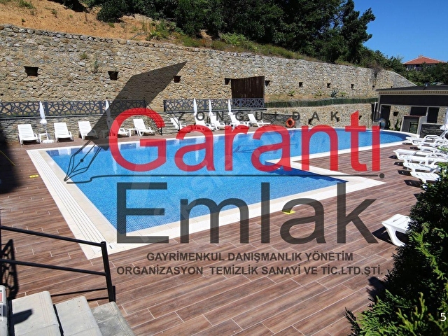 ZONGULDAK GARANTİ EMLAKTAN YÜZME HAVUZLU & GÜVENLİK HİZMETLİ KULELİDE EŞYALI 1+1 SATILIK DAİRE - Görsel 23