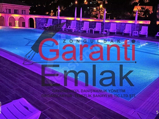 ZONGULDAK GARANTİ EMLAKTAN YÜZME HAVUZLU & GÜVENLİK HİZMETLİ KULELİDE EŞYALI 1+1 SATILIK DAİRE - Görsel 26