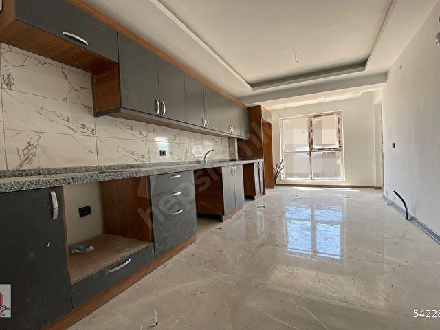 YENİKENTTE SIFIR 4+1 GENİŞ BALKONLU GİYNME ODALI EBEVEYN BANYOLU