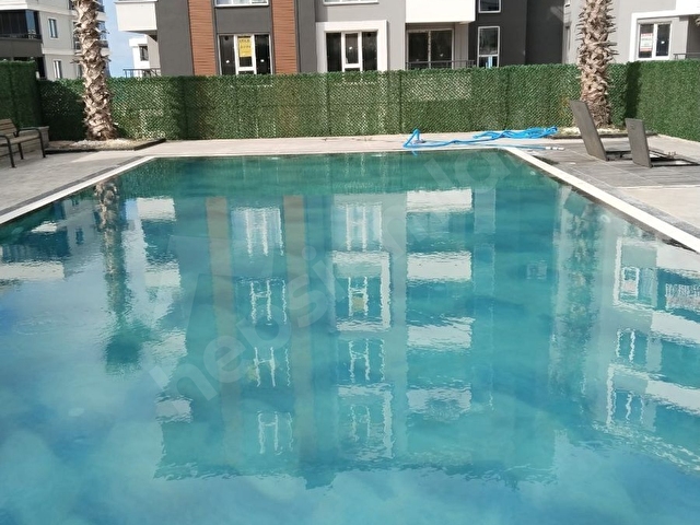 YÜZME HAVUZLU SIFIR EŞYALI 1+1 GENİŞ DAİRE