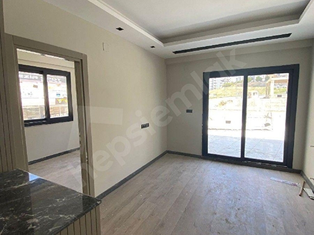 ÇUKUROVA FIRIN YAKINI KONSEPT BİNADA 1+1 MODERN YAPILI KÖŞE KONUMDA CAZİP DAİRE - Görsel 5