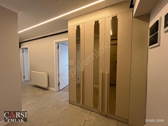 ÇARŞIDAN SIFIR BİNADA ARA KAT MERKEZİ KONUMDA YERDEN ISITMALI FERAH 2+1 - Görsel 11