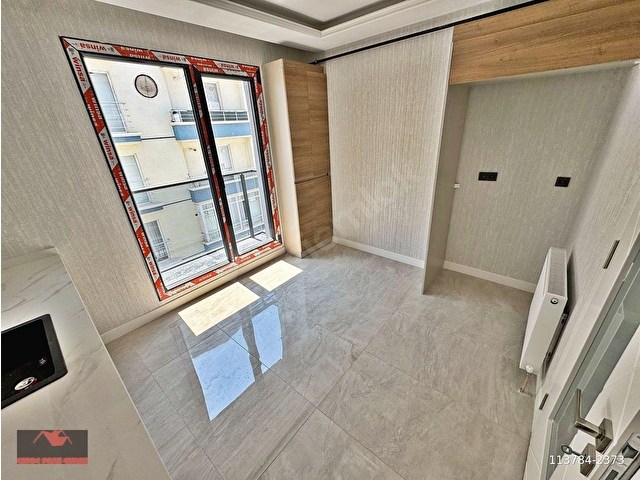 OVAKENTDE_EMSALLERİNİN_ALTINDA_ARA_KAT_SIFIR_E.BANYOLU_2+1_100M² - Görsel 7