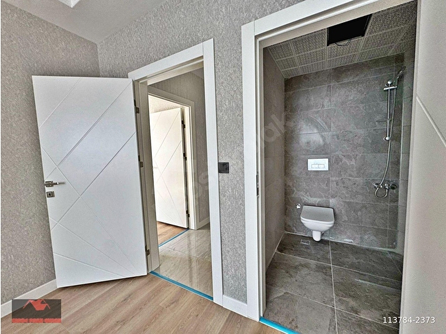 OVAKENTDE_EMSALLERİNİN_ALTINDA_ARA_KAT_SIFIR_E.BANYOLU_2+1_100M² - Görsel 17