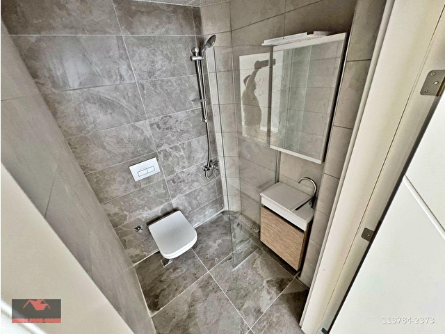 OVAKENTDE_EMSALLERİNİN_ALTINDA_ARA_KAT_SIFIR_E.BANYOLU_2+1_100M² - Görsel 18