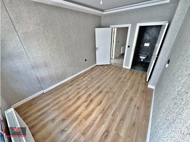 OVAKENTDE_EMSALLERİNİN_ALTINDA_ARA_KAT_SIFIR_E.BANYOLU_2+1_100M² - Görsel 16
