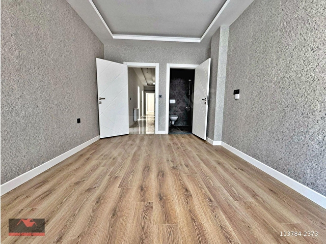 OVAKENTDE_EMSALLERİNİN_ALTINDA_ARA_KAT_SIFIR_E.BANYOLU_2+1_100M² - Görsel 14