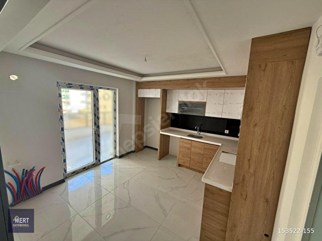 MERTDEN ÇOĞLUDA YÜKSEK METREKARE MİLLET BAHÇESİ CEPHE 3+1 DAİRE - Görsel 2