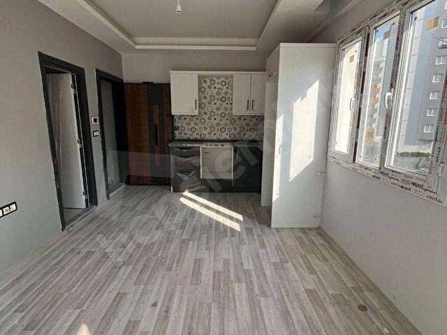 GÜLTEPEDE BULVAR ÜSTÜ İSKANLI SIFIR 1+1 DAİRE - Görsel 2