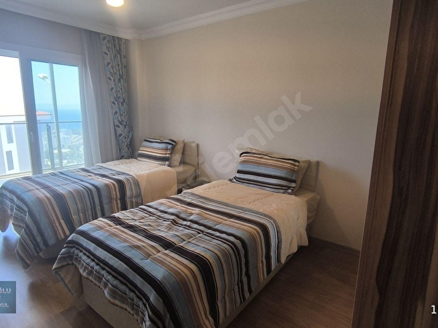 KUŞADASI MERKEZDE DENİZ MANZARALI HAVUZLU SİTEDE ARAKAT DAİRE - Görsel 22