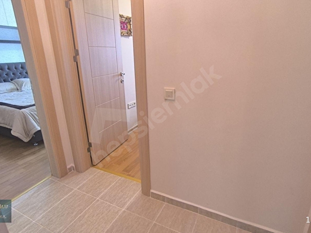 KUŞADASI MERKEZDE DENİZ MANZARALI HAVUZLU SİTEDE ARAKAT DAİRE - Görsel 23