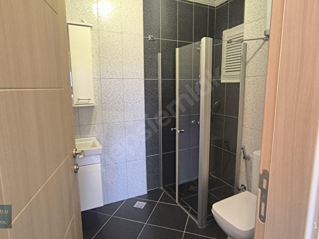 KUŞADASI MERKEZDE DENİZ MANZARALI HAVUZLU SİTEDE ARAKAT DAİRE - Görsel 19