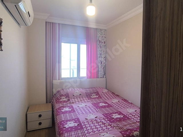 KUŞADASI MERKEZDE DENİZ MANZARALI HAVUZLU SİTEDE ARAKAT DAİRE - Görsel 25