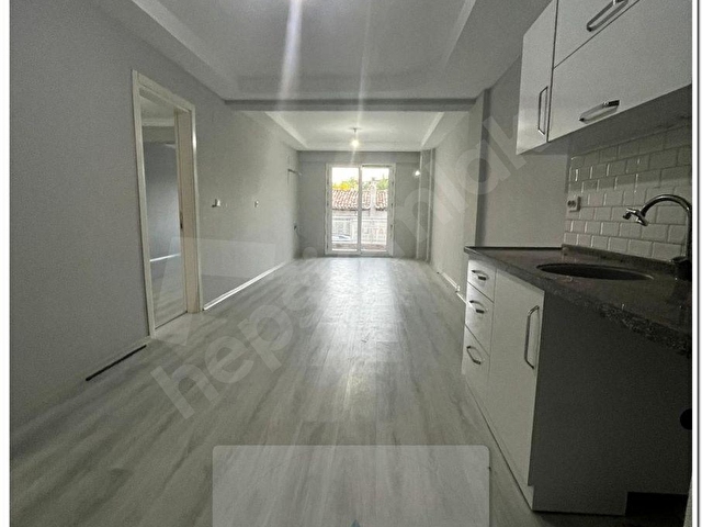 DUMLUPINAR MAHALLESİNDE 1+1 80m2 YATIRIMLIK DAİRE
