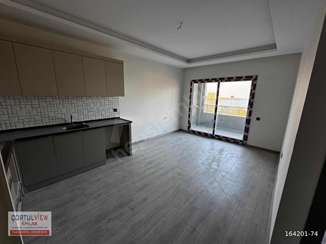 DENİZE YÜRÜME MESAFESİNDE HAVUZLU 1+1