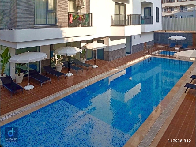 MERKEZDE DENİZE 200 M AYRI GİRİŞLİ 1+1+STÜDYO YÜKSEK KİRA GETİRİ - Görsel 2
